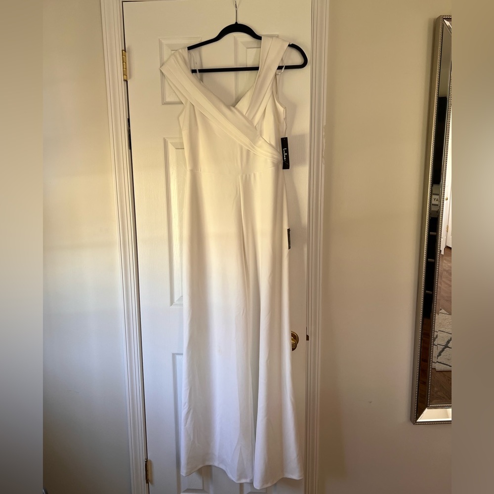 White Lulu’s jumpsuit, perfect for spring + summer brides
